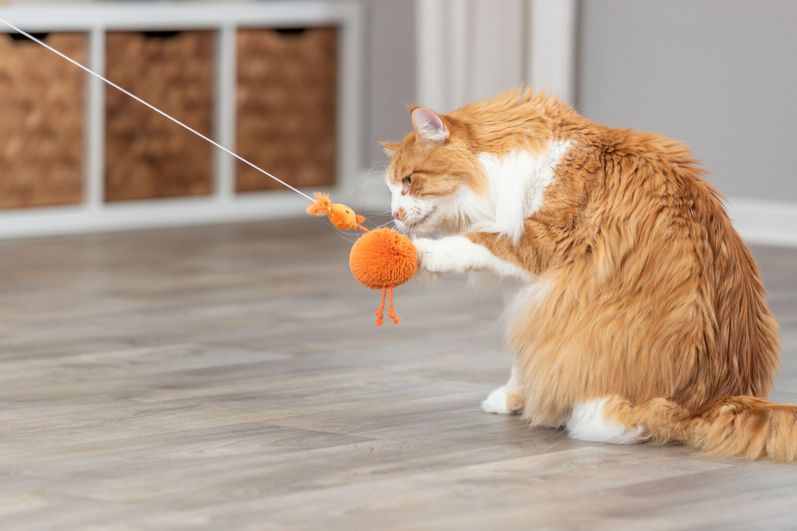 TRIXIE Plyšové kuřátko na gumičce 20 cm